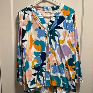Size small button up blouse.
